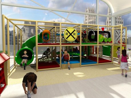 Parque infantil de interior con temática de estación de tren