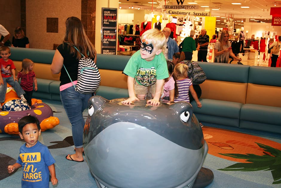 playing on a soft sculpt big shark