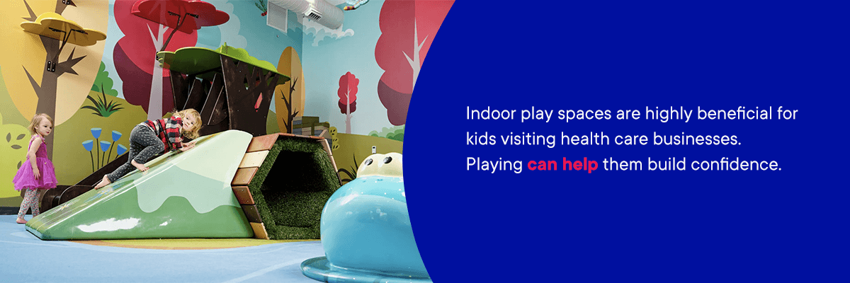 Children play at an indoor playground in a doctor's office