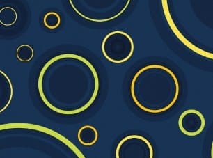 closeup of the carpet pattern for Elementz, dark blue with green and orange circles