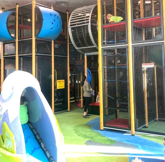 indoor playground with both contained play equipment and soft sculpture